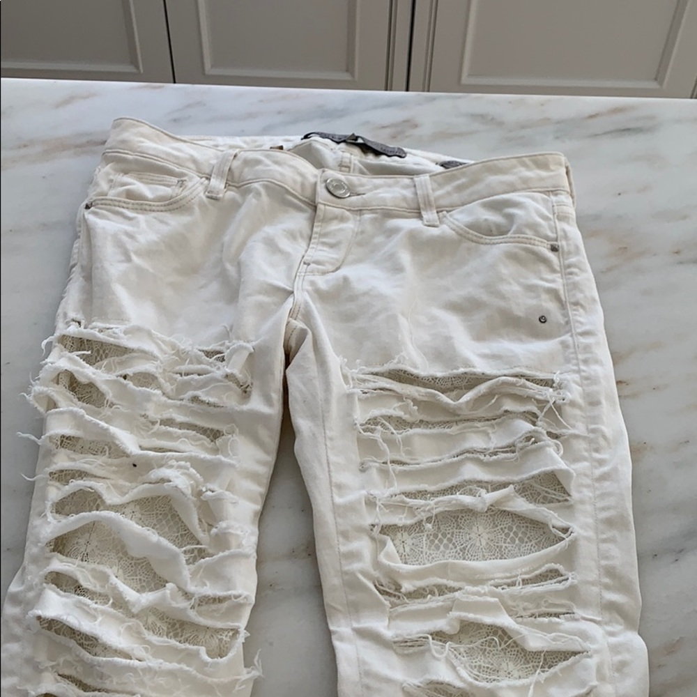 Guess cream skinny  ultra low sz 27 runs small